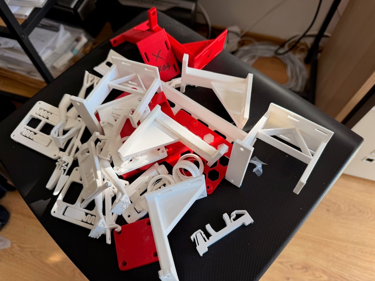 A 3D-printed platform raising the HQ camera and fisheye lens up to sit inside the acrylic dome